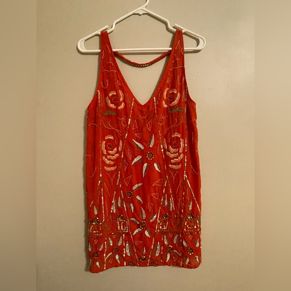 Embroidered and embellished coral colored Free People dress